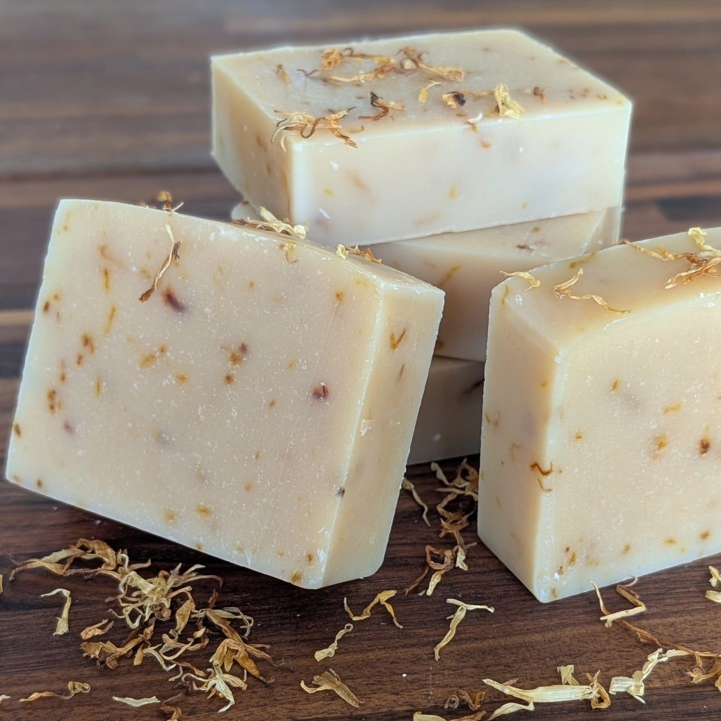 Bloom 'n Goat Orange Patchouli goat milk soap bars sprinkled with orange calendula petals